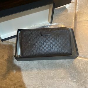 Gucci MicroGuccissima zip around wallet- new with tags- authentic-